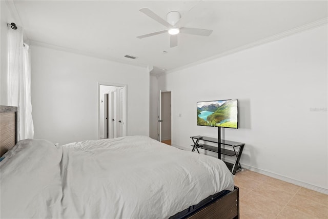 bedroom featuring crown molding, ceiling fan, and light tile patterned floors