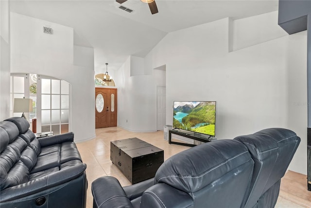 living room with lofted ceiling and ceiling fan