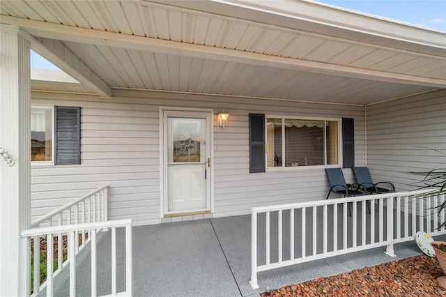 property entrance featuring covered porch