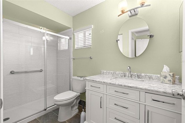17664 SE 105th Ter, Summerfield, FL 34491 - bathroom with toilet, vanity, a stall shower, a textured ceiling, and tile patterned flooring