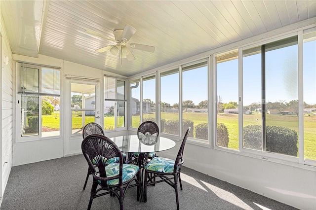 17664 SE 105th Ter, Summerfield, FL 34491 - sunroom with ceiling fan and outdoor dining space
