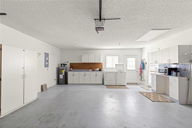 17664 SE 105th Ter, Summerfield, FL 34491 - garage with separate washer and dryer, electric water heater, electric panel, and a garage door opener