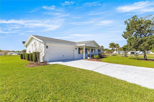 17664 SE 105th Ter, Summerfield, FL 34491 - ranch-style house with concrete driveway, a garage, and a front yard