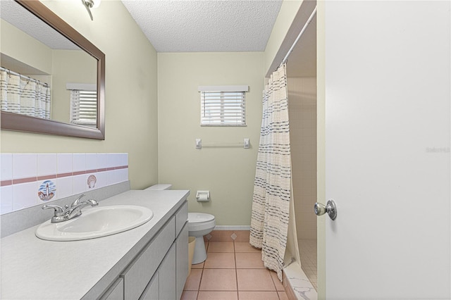 17664 SE 105th Ter, Summerfield, FL 34491 - full bath with toilet, a textured ceiling, vanity, a shower with shower curtain, and tile patterned flooring