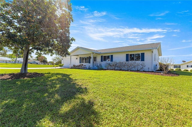 17664 SE 105th Ter, Summerfield, FL 34491 - ranch-style house featuring a front lawn, a garage, and concrete driveway