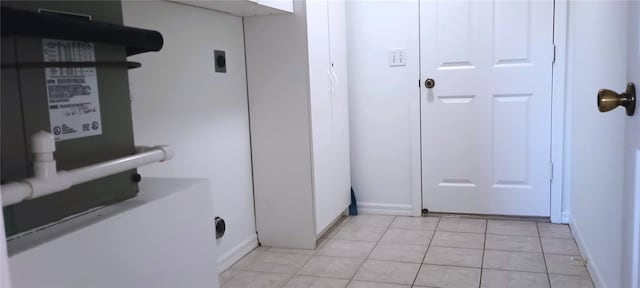 hallway with light tile patterned flooring