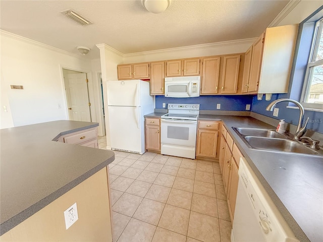 kitchen featuring dark countertops, visible vents, light brown cabinets, a sink, and white appliances