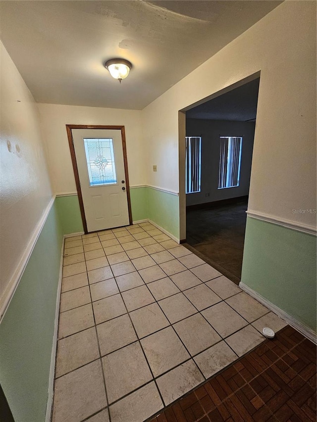 foyer with light tile patterned floors