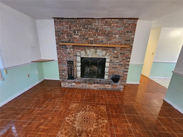 unfurnished living room with a fireplace