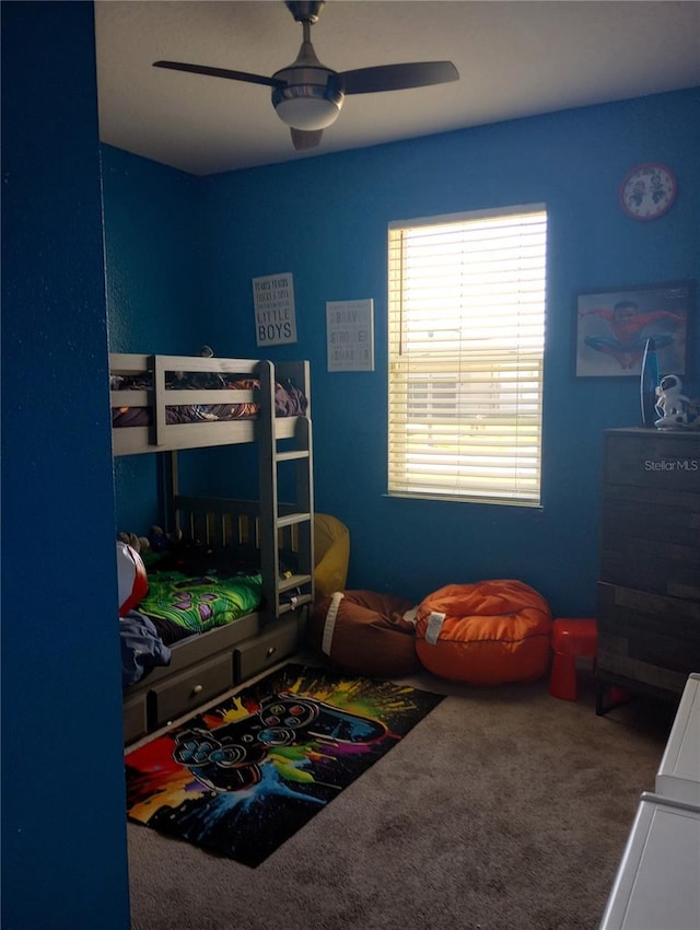 bedroom featuring carpet floors and ceiling fan