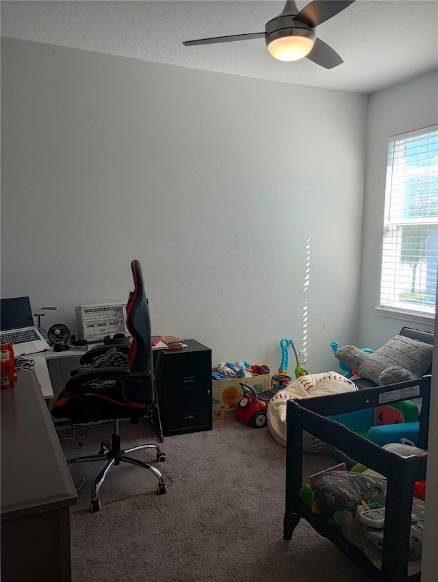 carpeted bedroom with ceiling fan