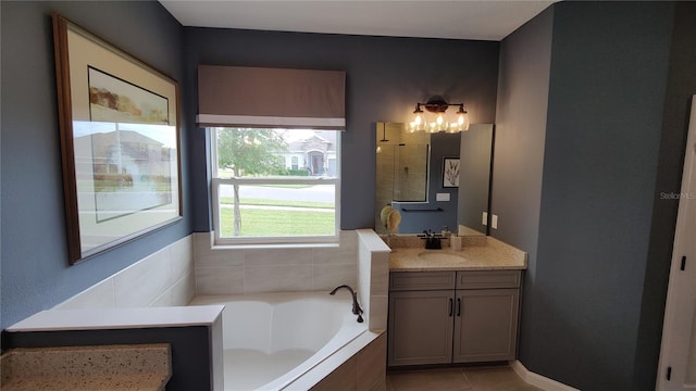 bathroom with vanity, plus walk in shower, and tile patterned flooring