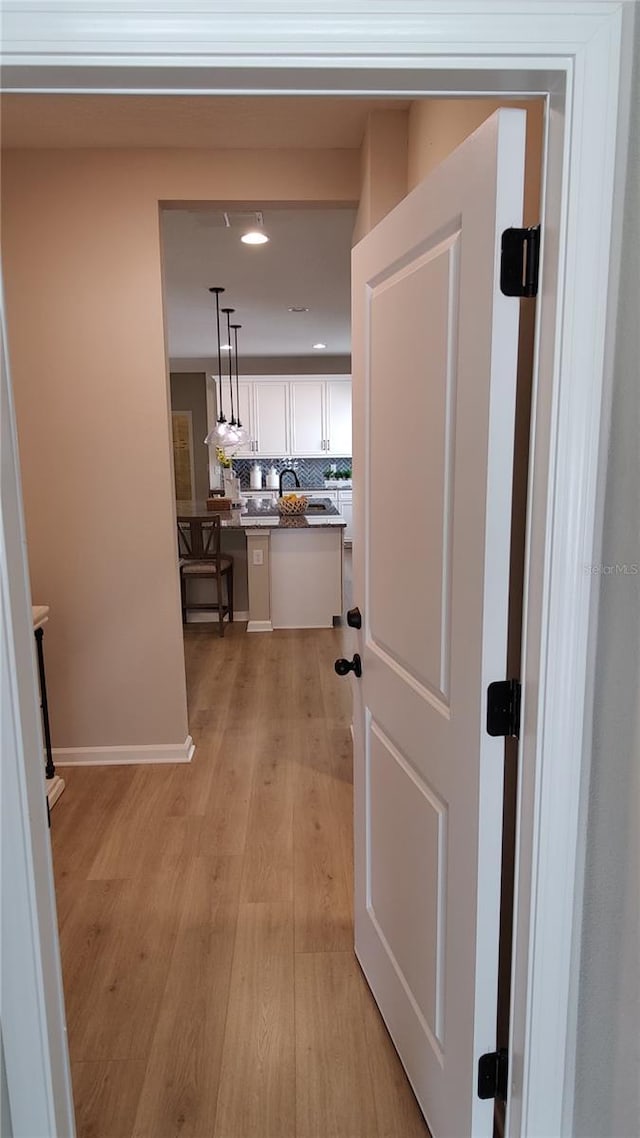 hall featuring light hardwood / wood-style floors