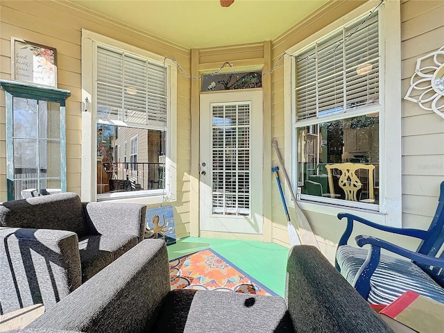 view of patio featuring ceiling fan