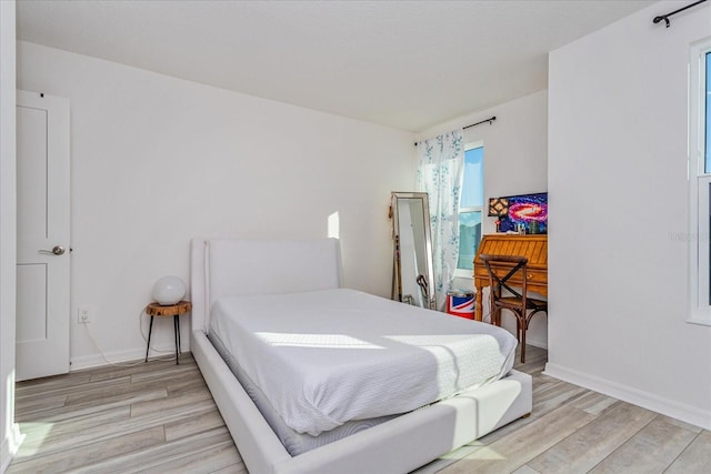 bedroom featuring light hardwood / wood-style flooring