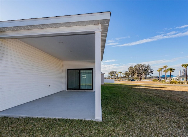 exterior space with a yard and a patio area