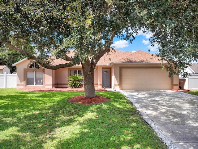 single story home featuring a garage and a front yard