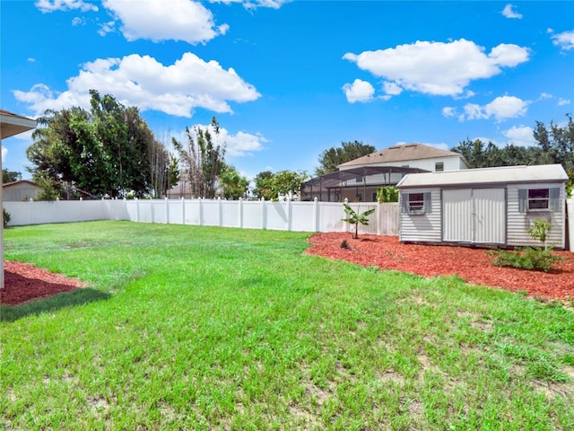 view of yard with a storage shed