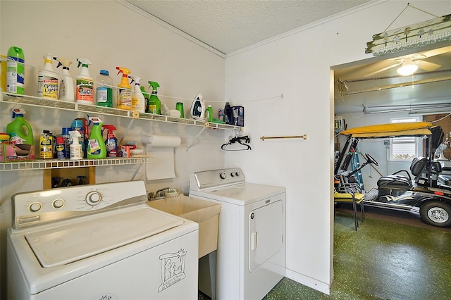 washroom featuring independent washer and dryer and a textured ceiling