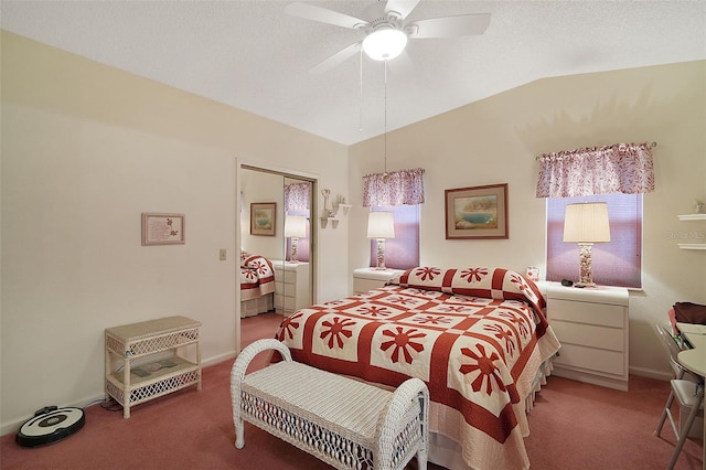 bedroom featuring ceiling fan, lofted ceiling, carpet floors, and a textured ceiling