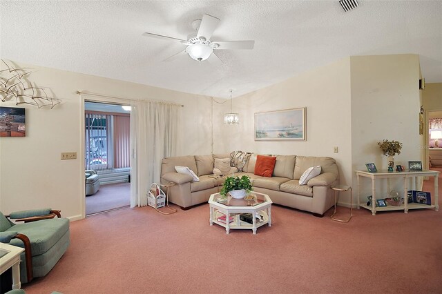 carpeted living room featuring ceiling fan, lofted ceiling, and a textured ceiling