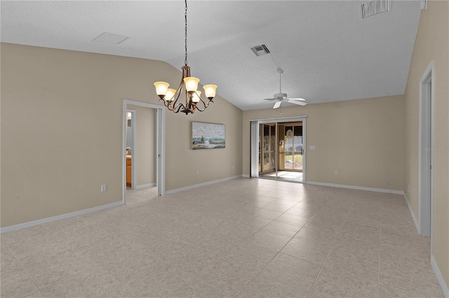 tiled empty room featuring lofted ceiling, ceiling fan with notable chandelier, and a textured ceiling