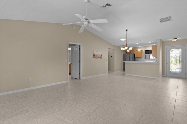 unfurnished living room with lofted ceiling and ceiling fan with notable chandelier