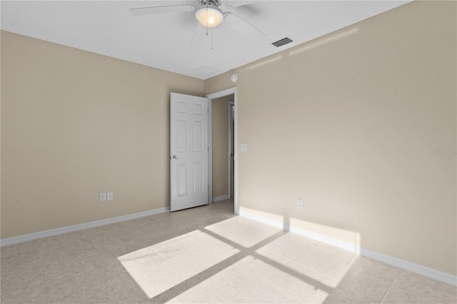 unfurnished room featuring ceiling fan