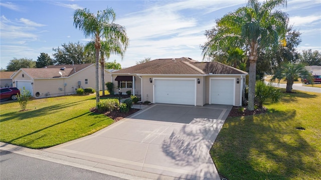 ranch-style house featuring a garage and a front lawn