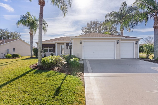 ranch-style home with a garage and a front yard