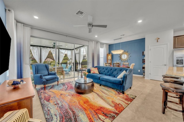 living room with recessed lighting, light tile patterned floors, a ceiling fan, and visible vents