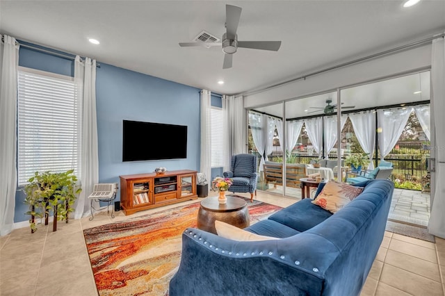 living area featuring recessed lighting, visible vents, a ceiling fan, and tile patterned flooring