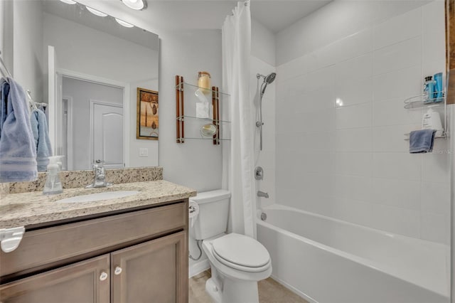 full bath featuring toilet, vanity, and shower / bath combination with curtain