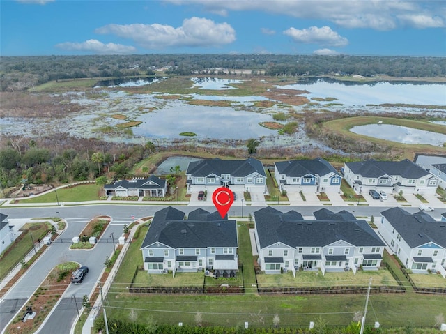 aerial view featuring a residential view and a water view