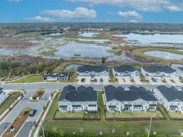 aerial view with a water view and a residential view