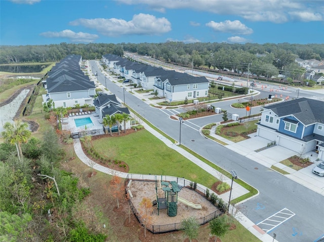 birds eye view of property with a residential view