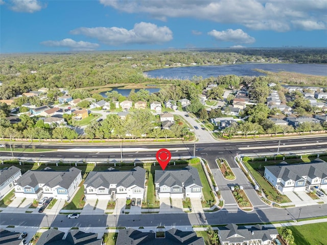 aerial view featuring a residential view and a water view