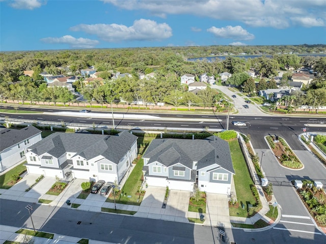 birds eye view of property with a residential view