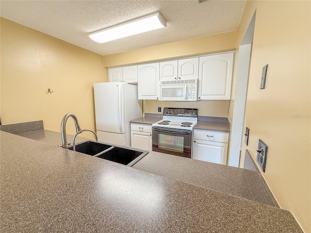 kitchen with white cabinetry, white appliances, sink, and a textured ceiling