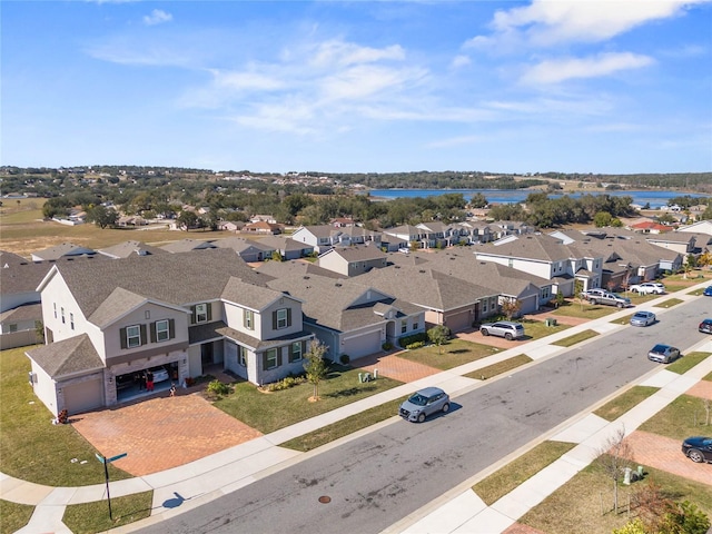 drone / aerial view with a water view