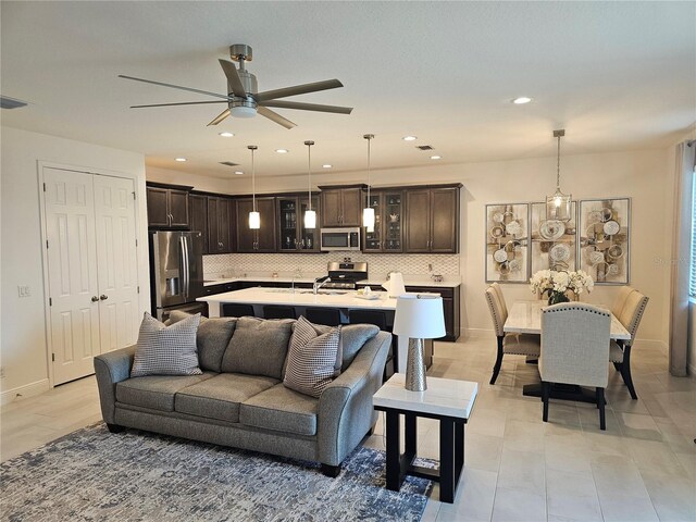 living room featuring ceiling fan