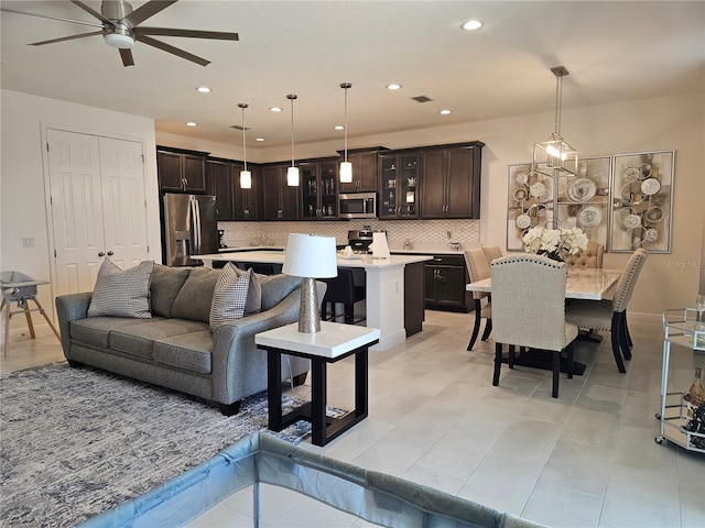 living room featuring ceiling fan