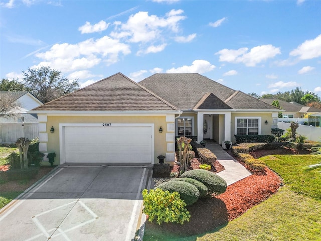 view of front of home with a garage