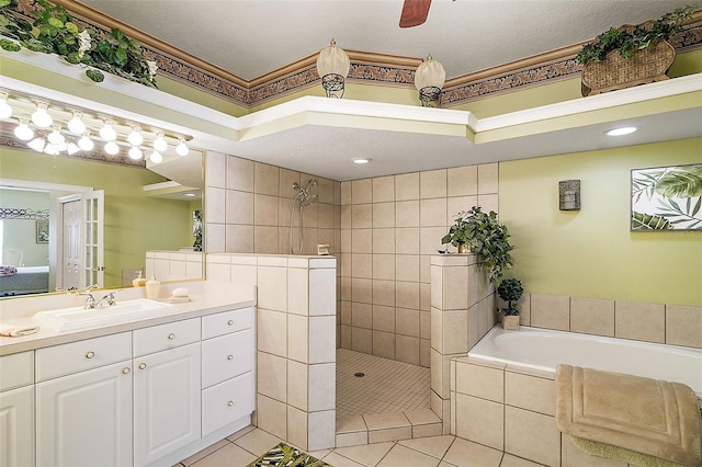 bathroom with tile patterned flooring, vanity, ornamental molding, and independent shower and bath