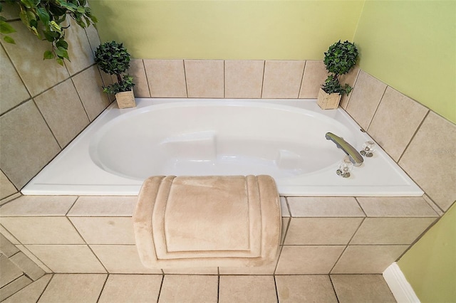 bathroom featuring tiled bath