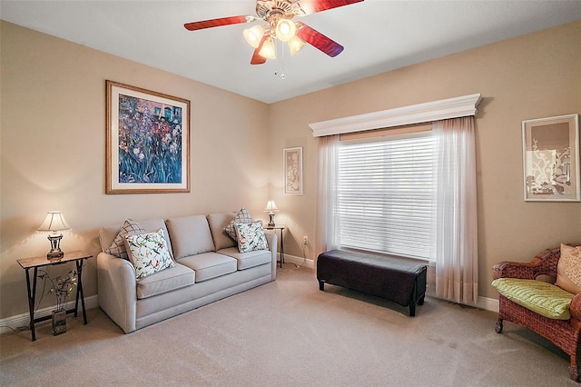 living room with ceiling fan and light carpet