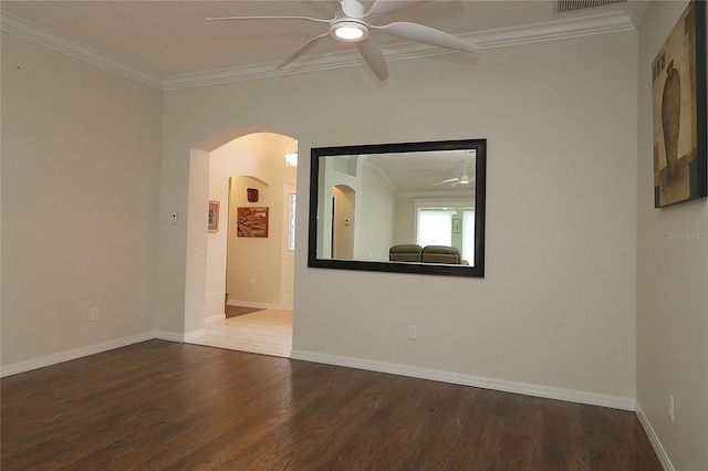 spare room featuring crown molding, ceiling fan, and hardwood / wood-style flooring