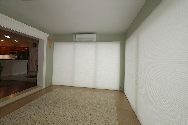 interior space featuring a wall mounted AC