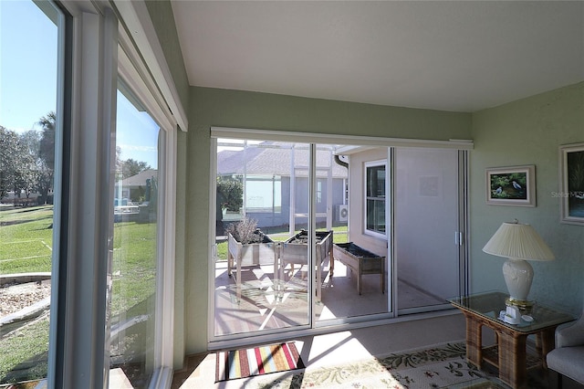 sunroom featuring a wealth of natural light