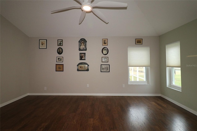 empty room featuring dark hardwood / wood-style floors and ceiling fan